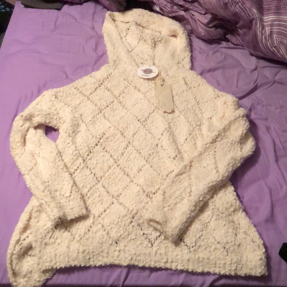 white fuzzy sweater